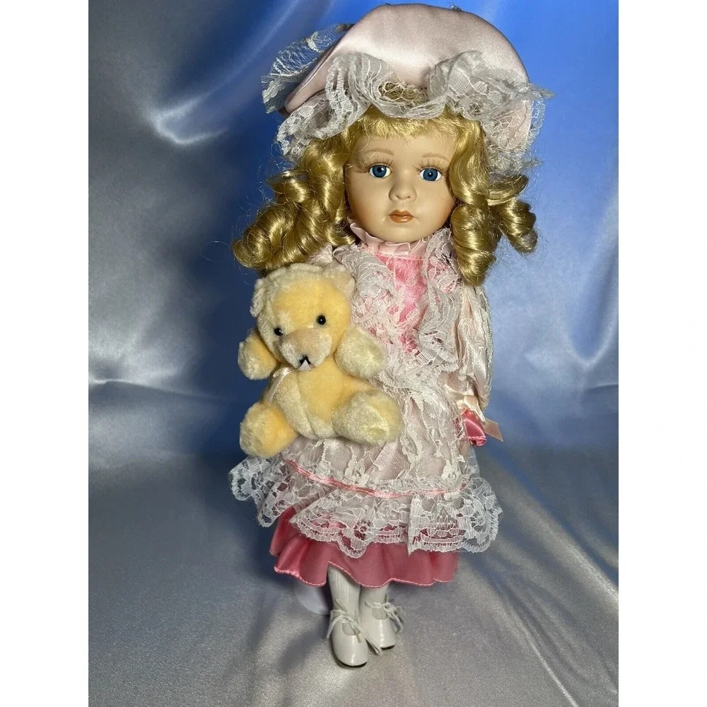 Menie Porcelain Doll with Pink Dress, Hat and Teddy Bear by Menie